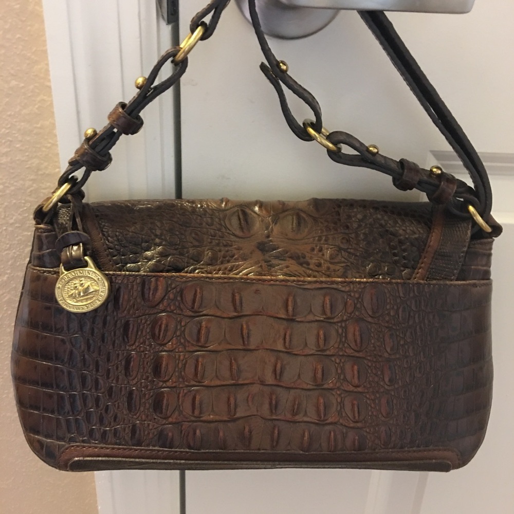 Dooney Bourke and Brahman handbags.